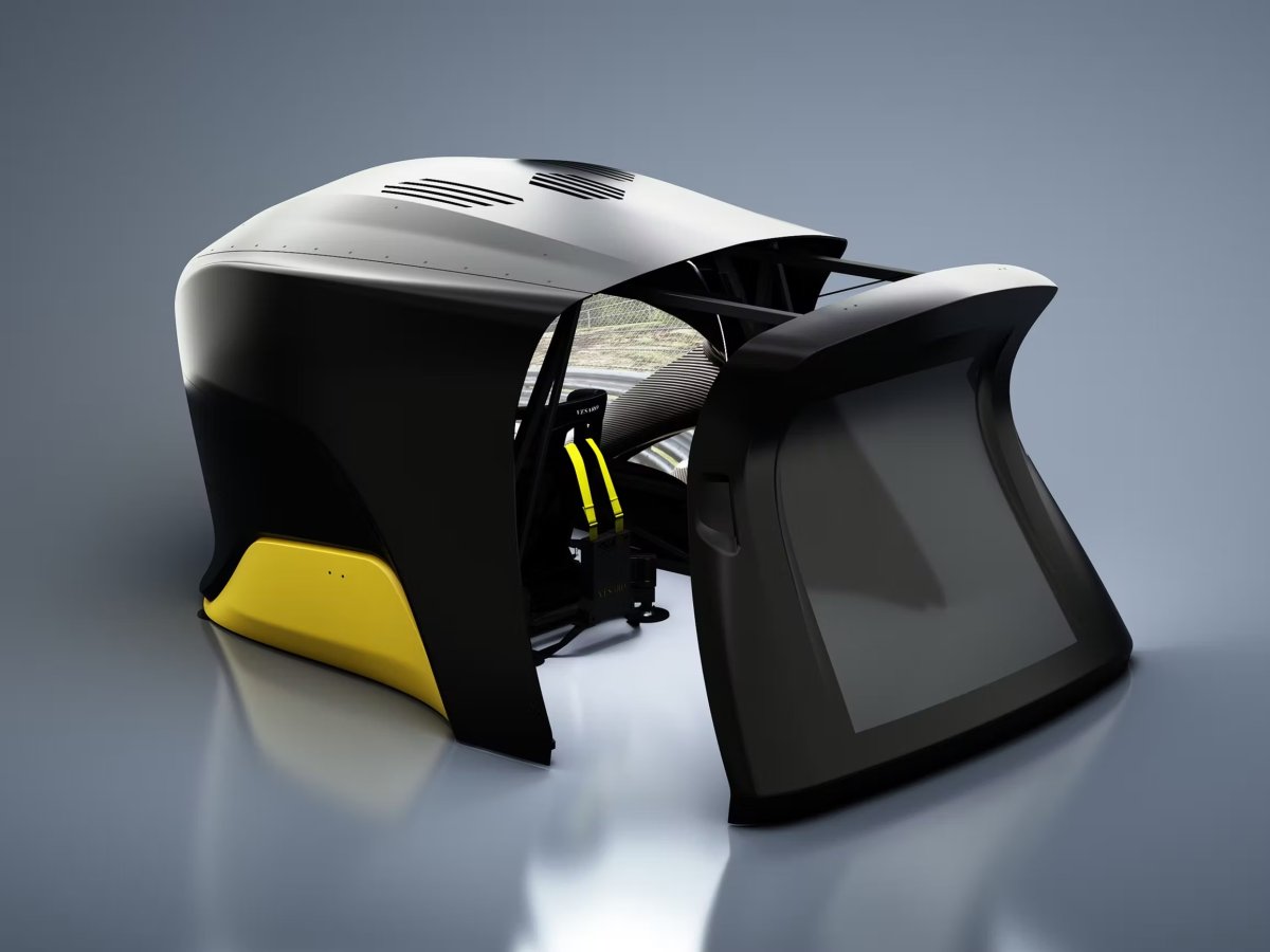 Vesaro simulator with gold accents and dual curved monitors