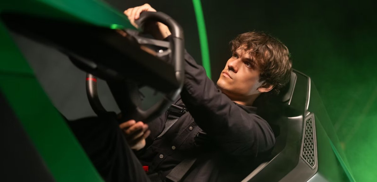 A driver experiencing immersive racing simulation