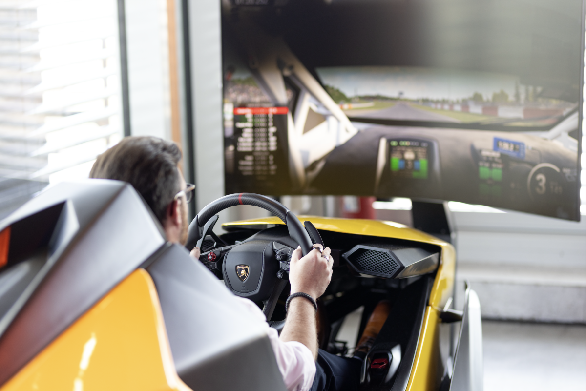 Race car simulator cockpit offering immersive driving